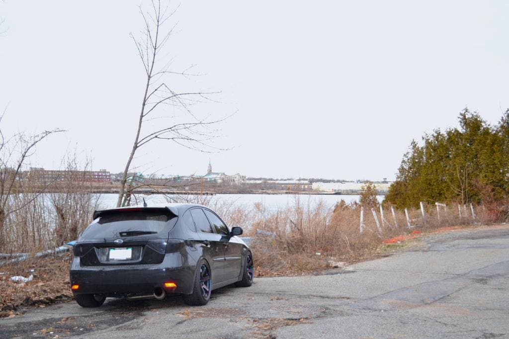 2011 Subaru Impreza WRX with 18x9.5 Rota Grid wheels