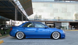 2004 Subaru Impreza with 18x9.5 Rota MXR wheels