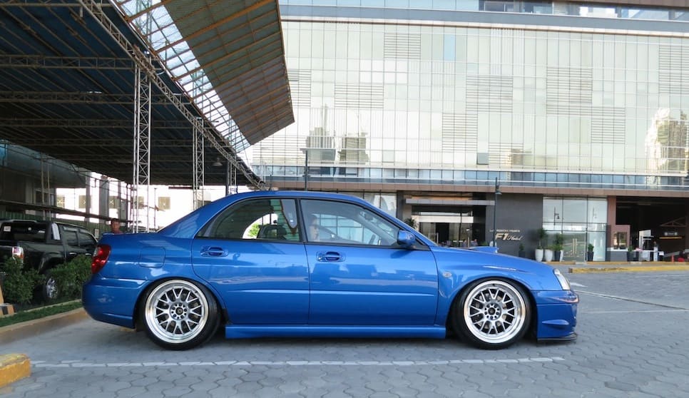 2004 Subaru Impreza with 18x9.5 Rota MXR wheels