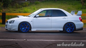 2004 Subaru Impreza with 18x9.5 Rota Grid wheels