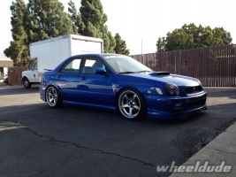 2003 Subaru Impreza with 18x9.5 Rota RT5 wheels