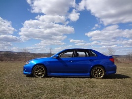 2011 Subaru Impreza with 18x8 Rota Tarmac 3 wheels