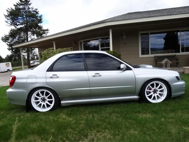 2002 Subaru Impreza with 18x9.5 Rota DPT wheels