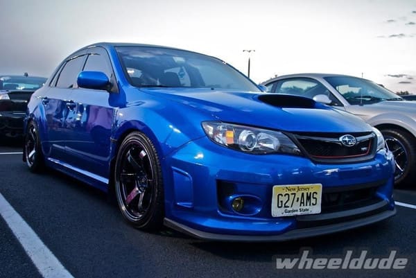 2011 Subaru Impreza WRX with 18x9.5 Rota Grid wheels