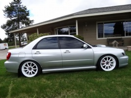 2002 Subaru Impreza with 18x9.5 Rota DPT wheels