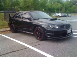 2007 Subaru Impreza with 17x8 Rota G-Force wheels