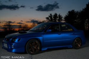 2002 Subaru Impreza with 17x9 Rota Grid wheels