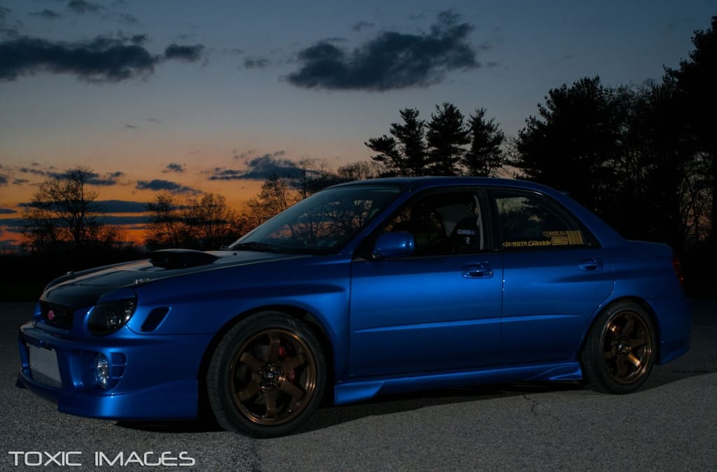 2002 Subaru Impreza with 17x9 Rota Grid wheels