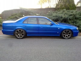 2001 Nissan R31-R34 Skyline 4dr with 18x9.5 Work Emotion XT-7 wheels