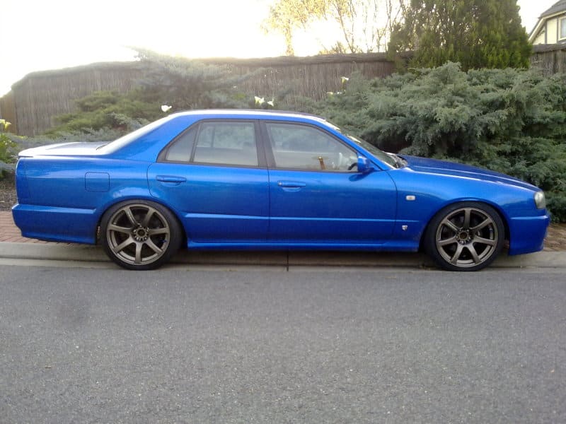 2001 Nissan R31-R34 Skyline 4dr with 18x9.5 Work Emotion XT-7 wheels