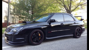 2009 Subaru Impreza with 18x8 Enkei P45F wheels