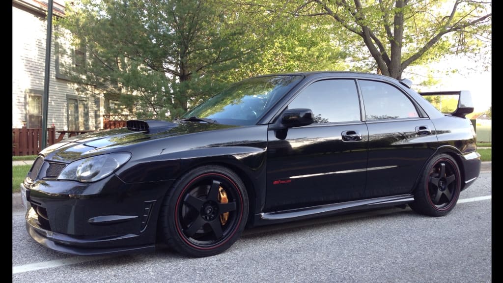 2009 Subaru Impreza with 18x8 Enkei P45F wheels