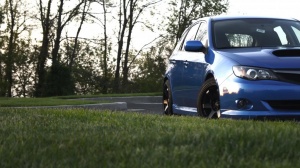 2011 Subaru Impreza WRX with 17x9 Rota Grid wheels