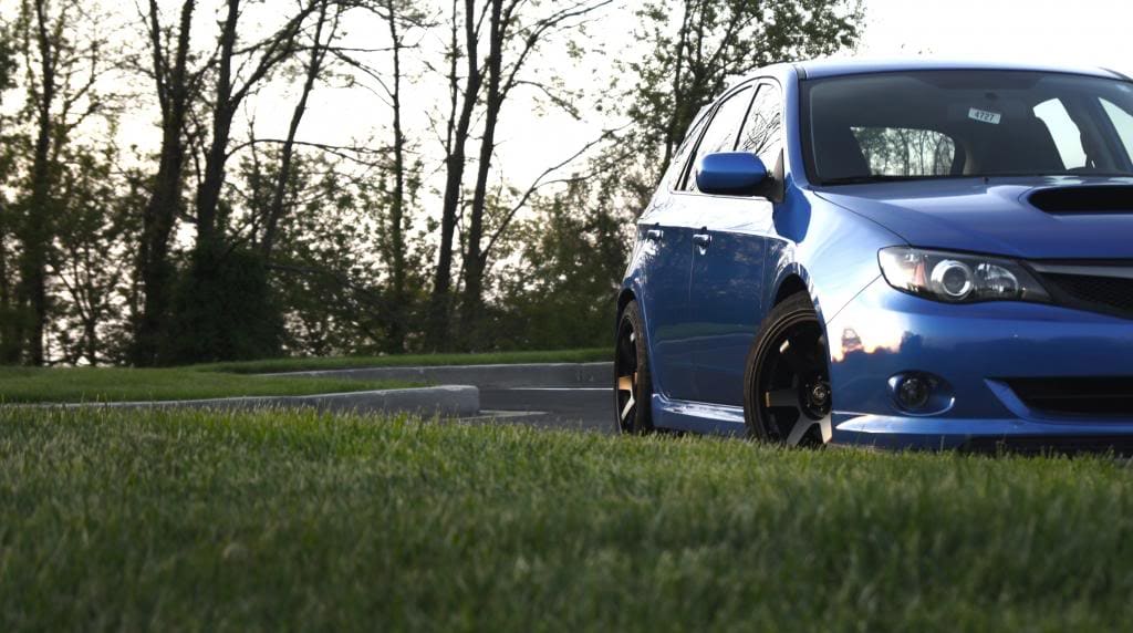 2011 Subaru Impreza WRX with 17x9 Rota Grid wheels