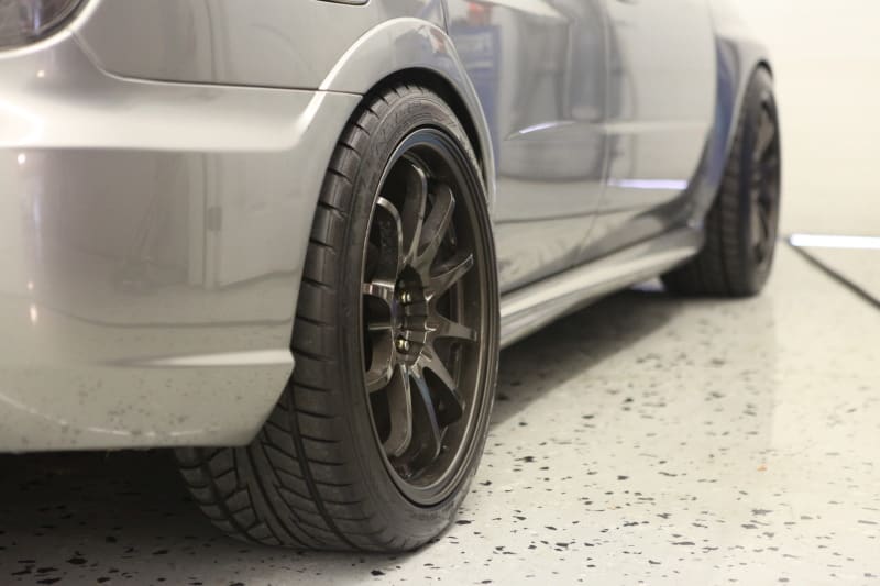 2009 Subaru Impreza with 18x9.5 Rota wheels