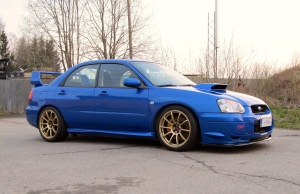 2004 Subaru Impreza with 18x9 Rota wheels