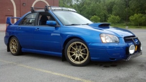 2004 Subaru Impreza with 17x8 Rota Titan wheels