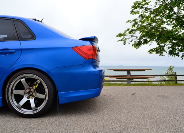 2011 Subaru Impreza WRX with 18x9.5 Rota Grid wheels