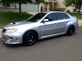 2010 Subaru Impreza with 18x9.5 Rota Grid wheels