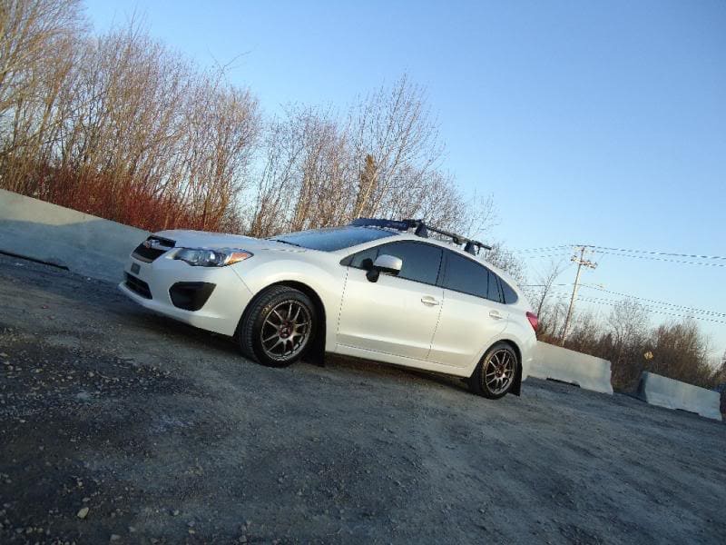 2012 Subaru Impreza with 17x8 Rota Torque wheels