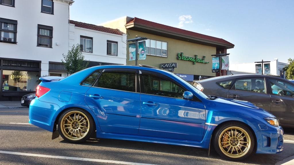 2011 Subaru Impreza WRX with 18x8.5 Rota SVN wheels
