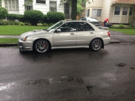 2004 Subaru Impreza with 17x8 Rota G-Force wheels