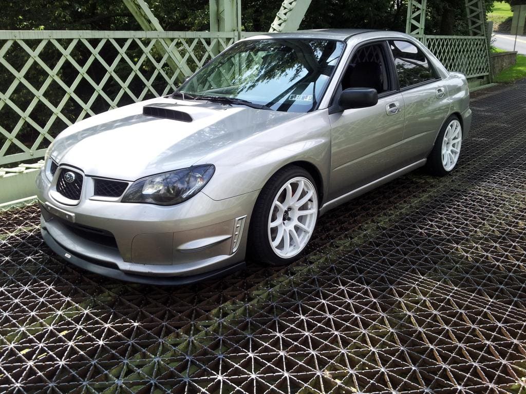 2010 Subaru Impreza with 18x9 Rota G-Force wheels
