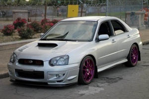 2004 Subaru Impreza with 18x8 Rota Torque wheels