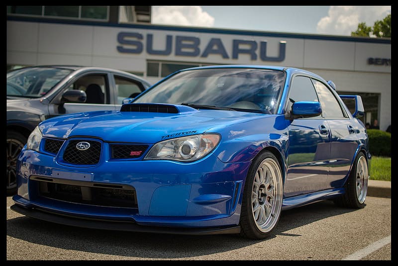 2006 Subaru Impreza WRX with 18x9.5 Rota MXR wheels