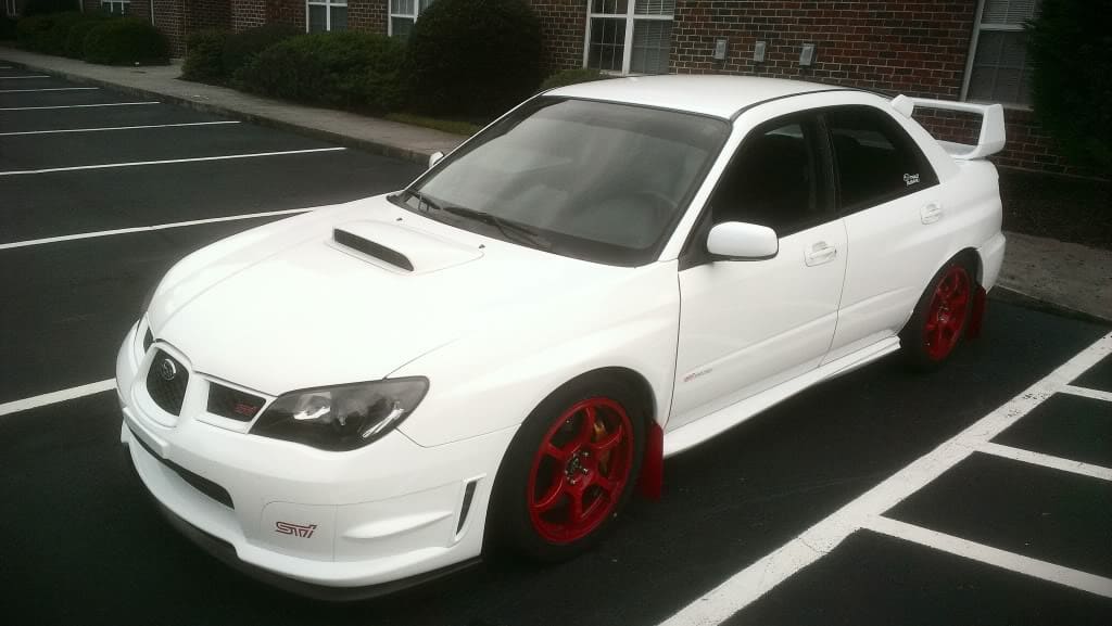 2009 Subaru Impreza with 17x8 Rota Boost wheels