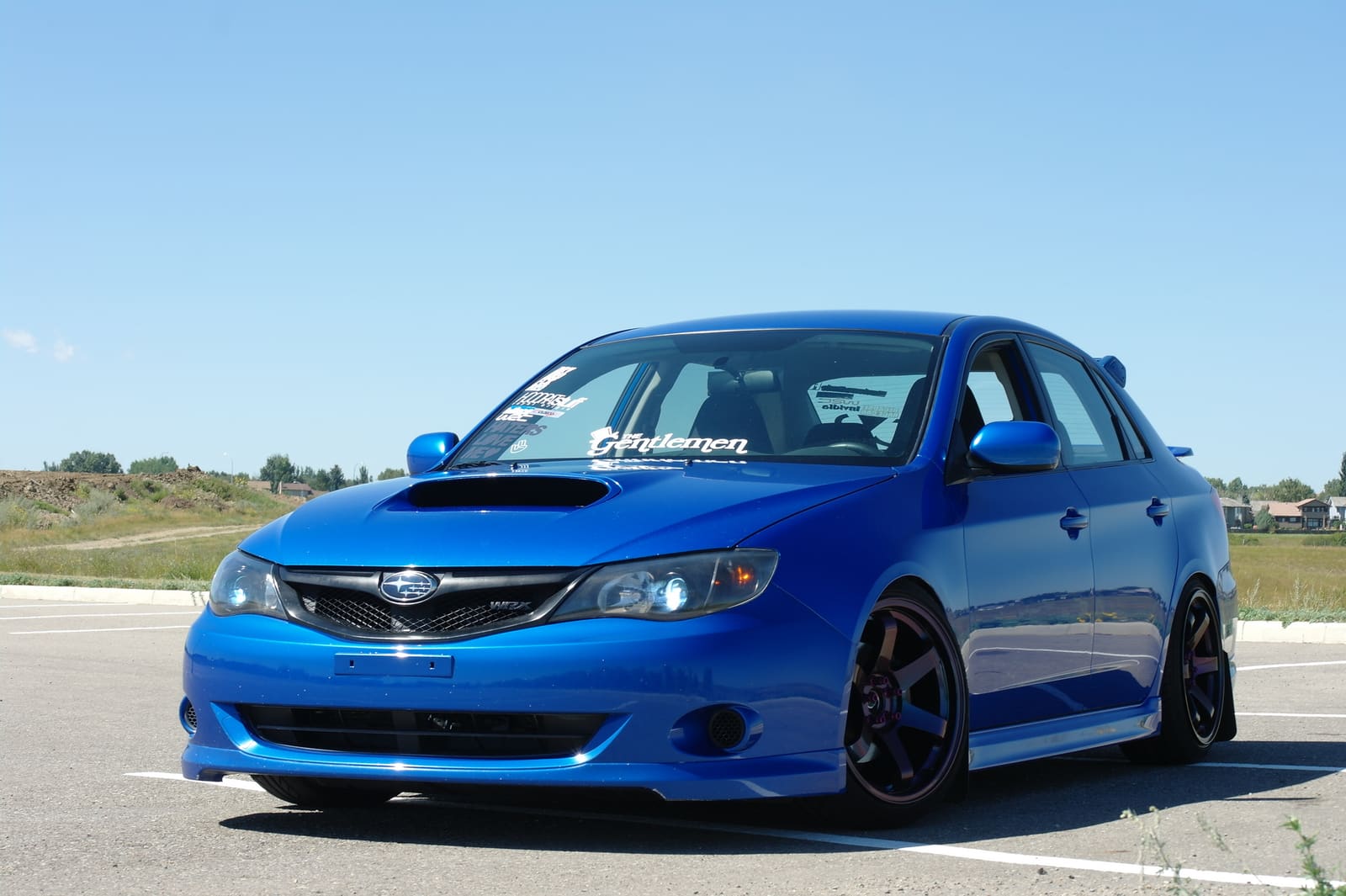 2011 Subaru Impreza WRX with 18x9.5 Rota Grid wheels
