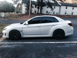 2011 Subaru Impreza WRX with 18x9.5 Rota G-Force wheels