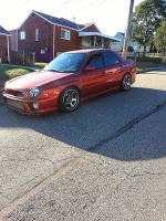 2003 Subaru Impreza with 17x9 Rota RT5 wheels