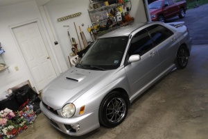 2002 Subaru Impreza with 17x8 Rota Torque wheels
