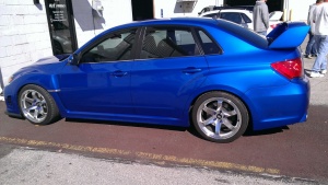 2011 Subaru Impreza WRX with 18x9.5 Rota Grid wheels