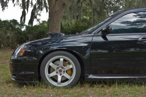 2005 Subaru Impreza with 17x9 Rota Grid wheels