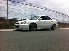 2005 Subaru Impreza with 17x9 Rota DPT wheels