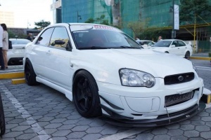 2004 Subaru Impreza with 18x10 Rota RT5 wheels