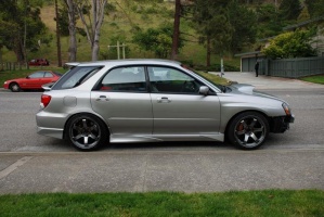 2005 Subaru Impreza WRX with 18x10 Rota Grid wheels