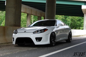 2007 Hyundai Tiburon with 18x9 Rota G-Force wheels
