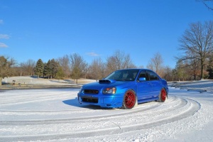 2004 Subaru Impreza with 17x8 Rota SVN wheels