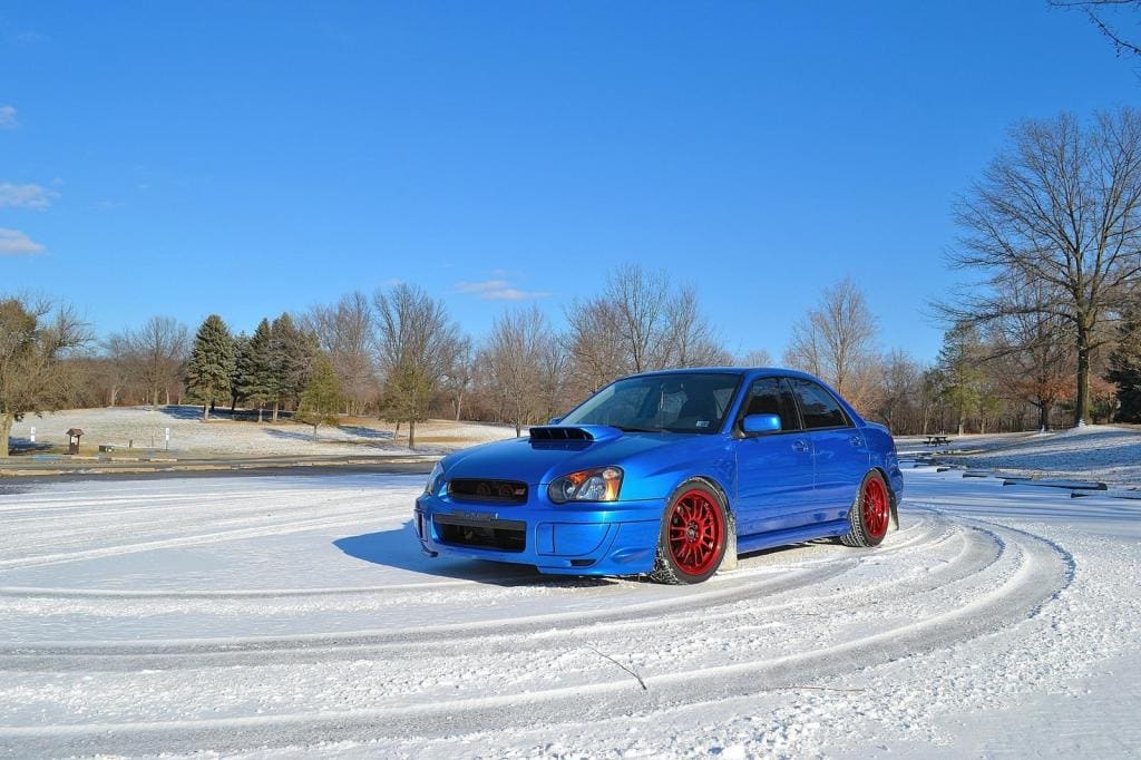 2004 Subaru Impreza with 17x8 Rota SVN wheels