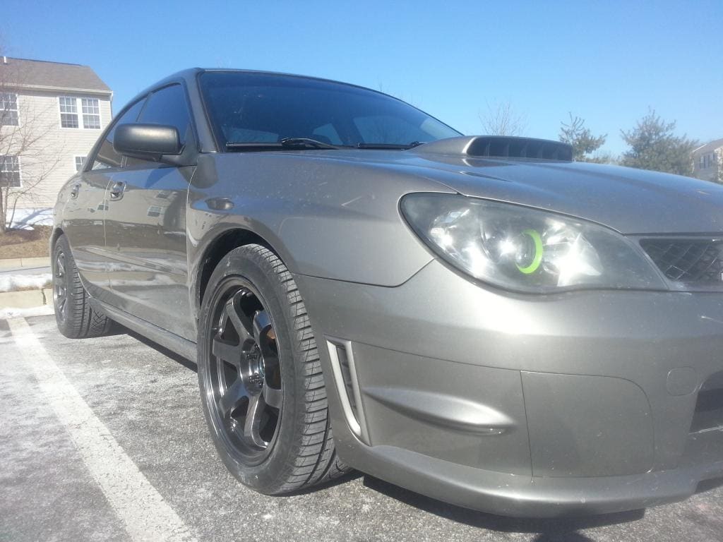 2008 Subaru Impreza with 17x9 Rota Grid wheels