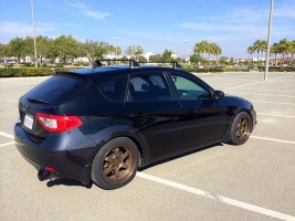 2011 Subaru Impreza WRX with 17x9 Rota Grid V wheels