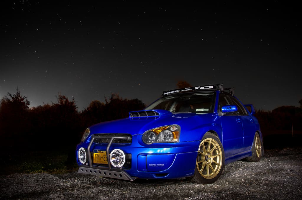 2004 Subaru Impreza with 17x8 Rota Titan wheels