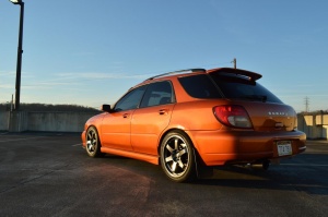 2004 Subaru Impreza with 18x8.5 Rota Grid wheels