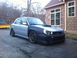 2002 Subaru Impreza with 17x7.5 Rota Subzero wheels