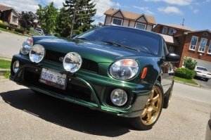 2002 Subaru Impreza with 17x8 Rota Grid wheels