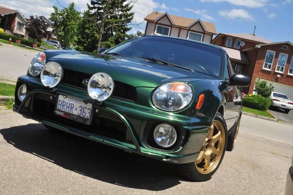 2002 Subaru Impreza with 17x8 Rota Grid wheels
