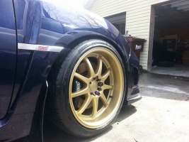 2011 Subaru Impreza WRX with 18x9.5 Rota wheels